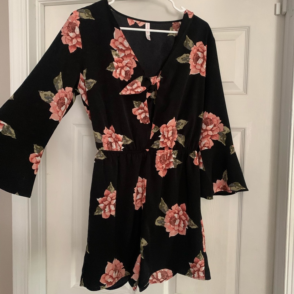Floral black romper - size small